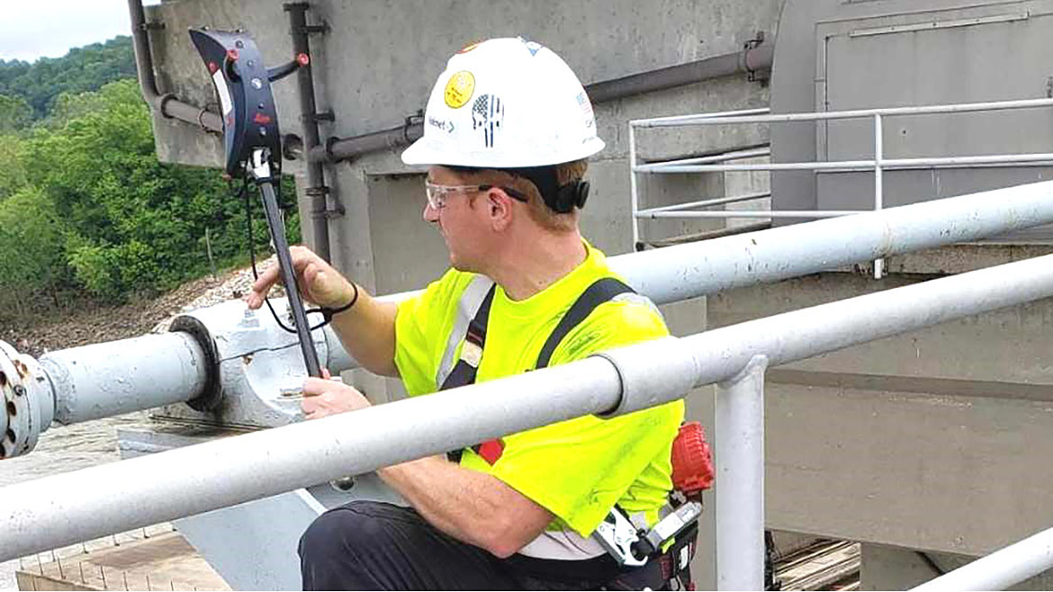 Metrologist using T-Probe at Hydropower Dam